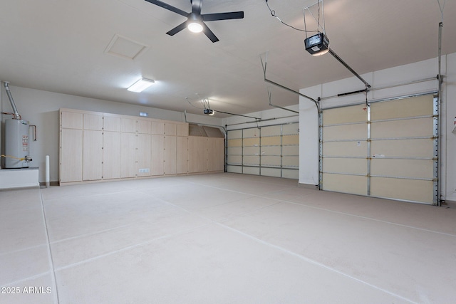 garage with a garage door opener, ceiling fan, and water heater