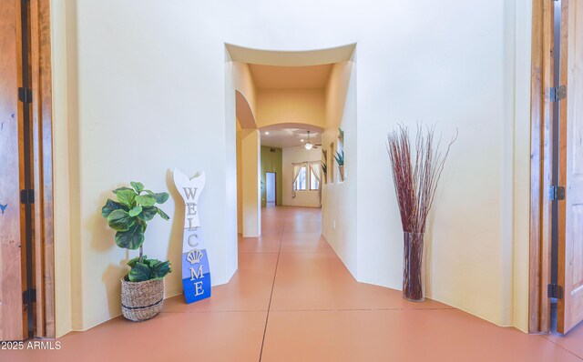 6754 E Roberto Loop, Hereford, AZ 85615 - corridor featuring tile patterned floors and arched walkways