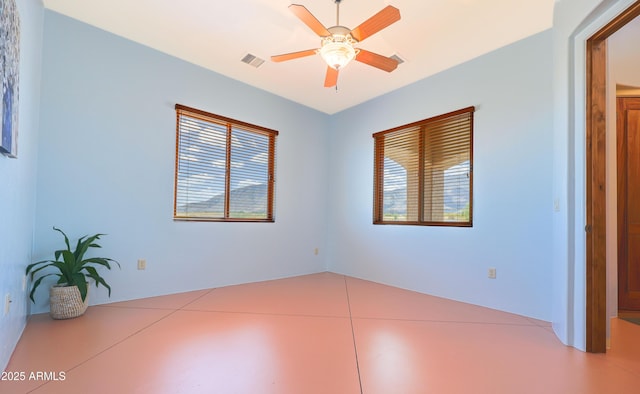 6754 E Roberto Loop, Hereford, AZ 85615 - spare room featuring healthy amount of natural light and ceiling fan