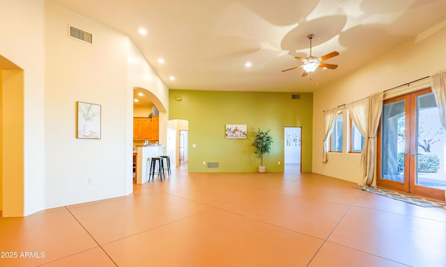 6754 E Roberto Loop, Hereford, AZ 85615 - spare room with arched walkways, recessed lighting, and a ceiling fan