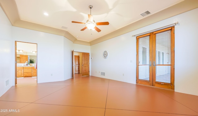 6754 E Roberto Loop, Hereford, AZ 85615 - unfurnished room featuring a ceiling fan and french doors