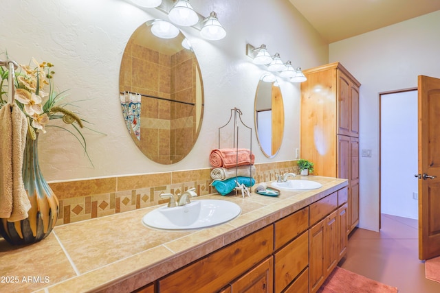 6754 E Roberto Loop, Hereford, AZ 85615 - bathroom featuring double vanity and a tile shower