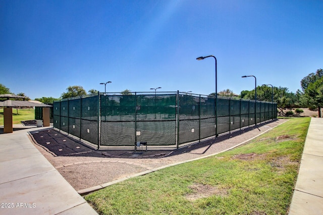 surrounding community featuring tennis court