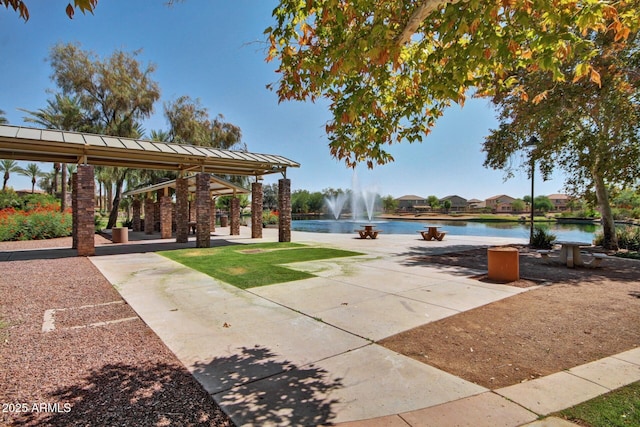 view of home's community featuring a water view