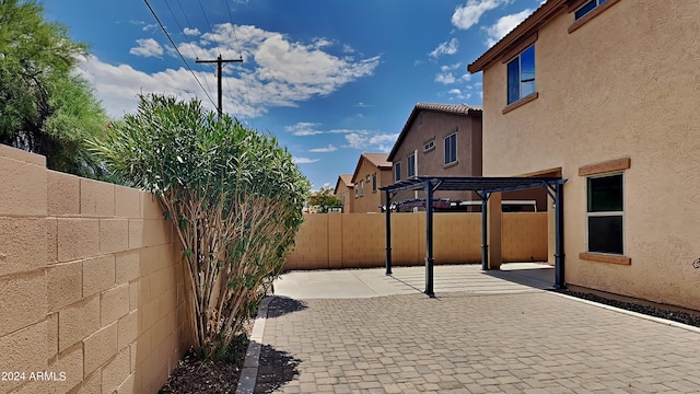 view of patio featuring a pergola