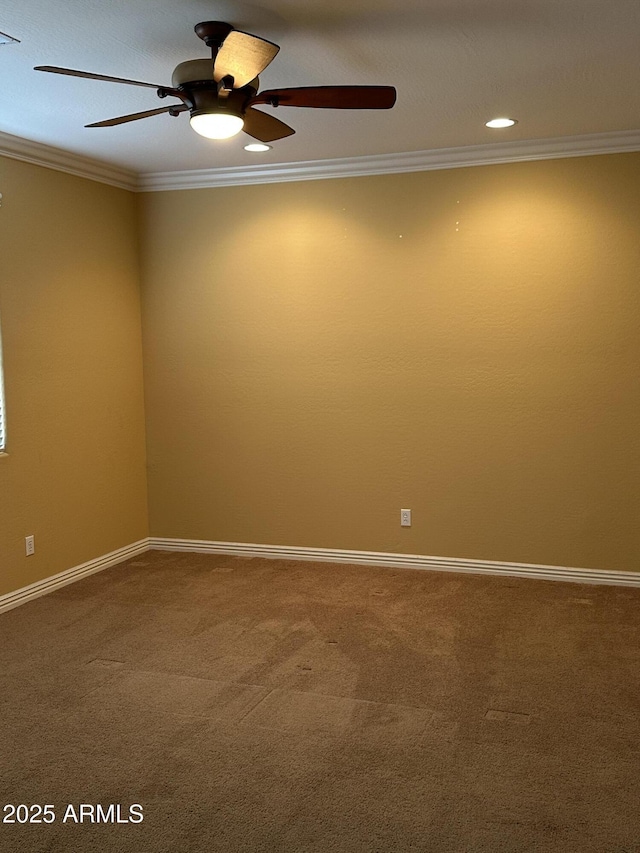 empty room with carpet, ornamental molding, baseboards, and recessed lighting