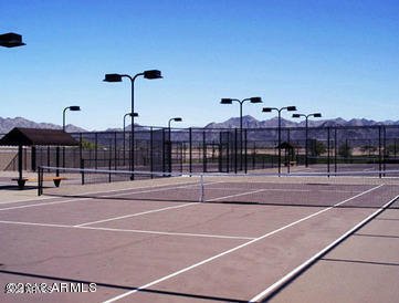 view of sport court featuring community basketball court and fence