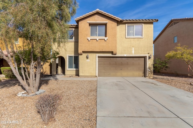 view of front of home featuring a garage