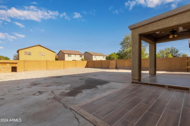 view of patio featuring ceiling fan