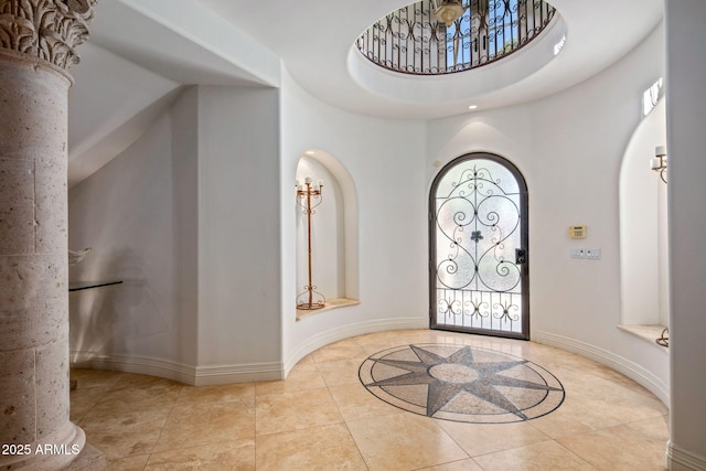 entrance foyer featuring a high ceiling