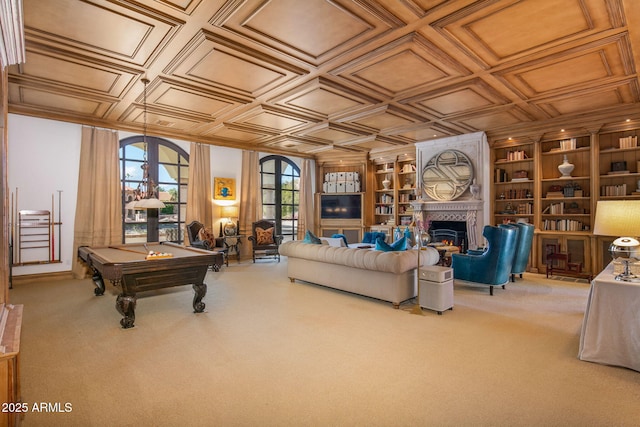 playroom with carpet flooring, pool table, a fireplace, and built in features