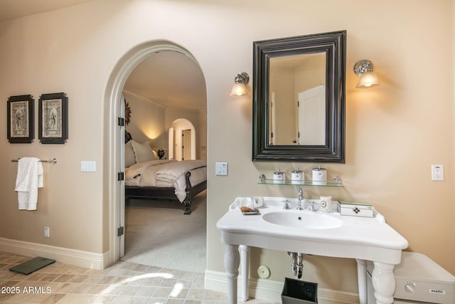 bathroom with tile patterned flooring and ornamental molding