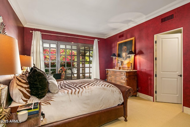 carpeted bedroom featuring crown molding