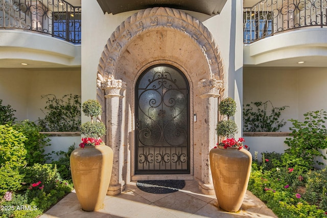 doorway to property featuring a balcony