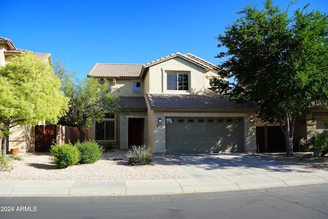 view of front of property with a garage