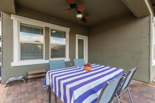 view of patio / terrace featuring ceiling fan