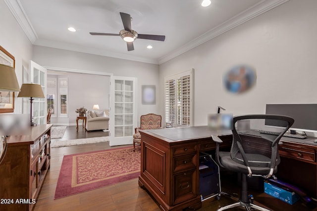 office area with ornamental molding, dark hardwood / wood-style floors, ceiling fan, and french doors