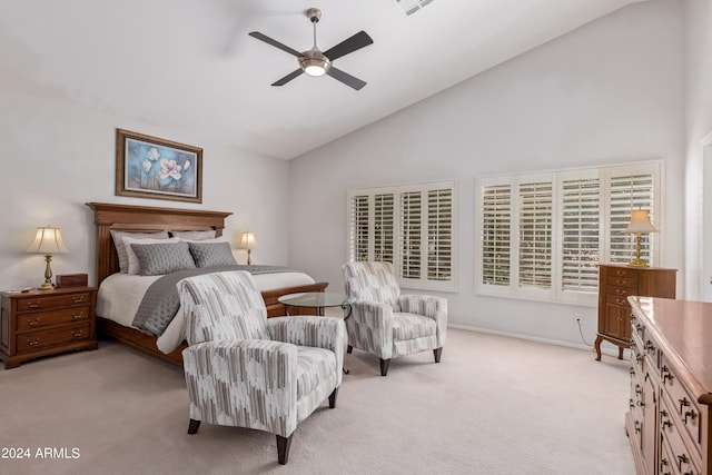 carpeted bedroom featuring high vaulted ceiling and ceiling fan