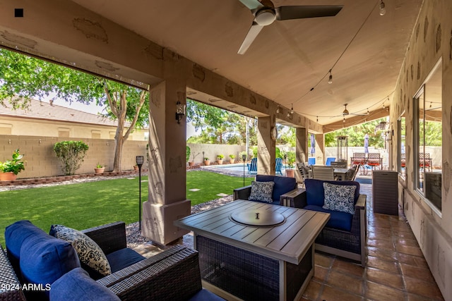 view of patio featuring a fenced in pool, an outdoor hangout area, and ceiling fan