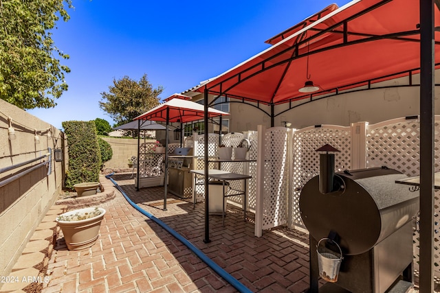 view of patio featuring a gazebo