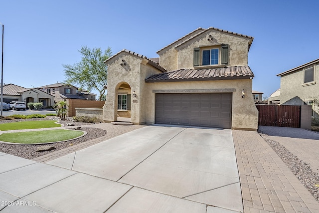 10925 E Toluca Ave, Mesa, AZ 85212 - mediterranean / spanish-style home featuring concrete driveway, stucco siding, and a tile roof