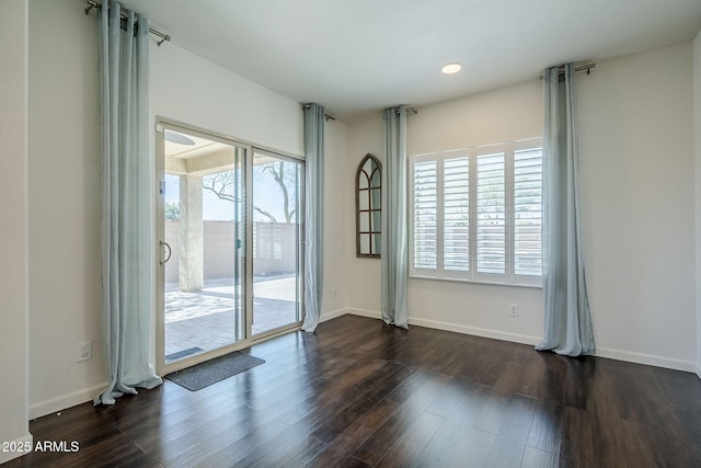 10925 E Toluca Ave, Mesa, AZ 85212 - spare room featuring dark wood finished floors, baseboards, and recessed lighting