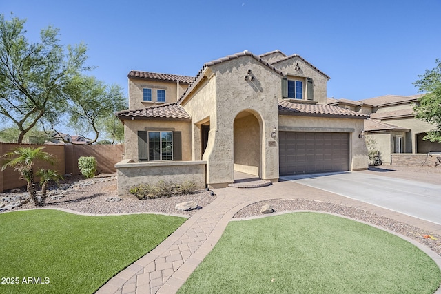 10925 E Toluca Ave, Mesa, AZ 85212 - mediterranean / spanish home featuring stucco siding, driveway, a tile roof, and an attached garage