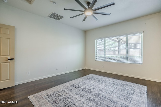 10925 E Toluca Ave, Mesa, AZ 85212 - empty room with ceiling fan, dark wood-style floors, and baseboards
