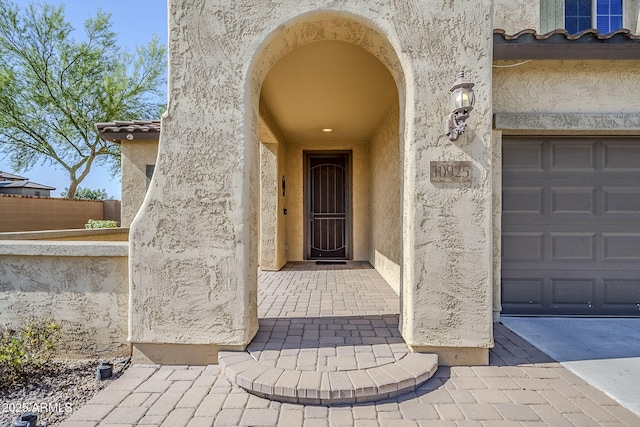 10925 E Toluca Ave, Mesa, AZ 85212 - doorway to property featuring stucco siding and a tiled roof