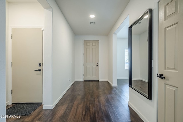 10925 E Toluca Ave, Mesa, AZ 85212 - foyer with dark wood-style flooring and baseboards