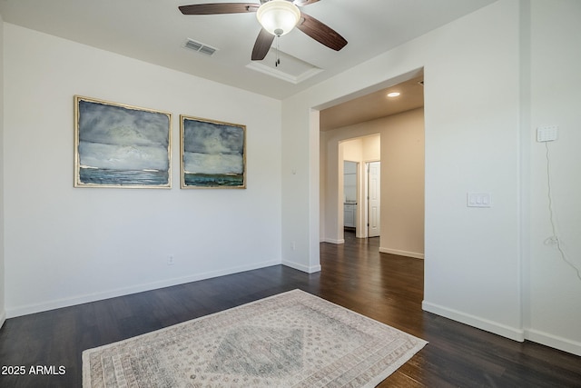 10925 E Toluca Ave, Mesa, AZ 85212 - unfurnished room featuring a ceiling fan, dark wood-style floors, and baseboards
