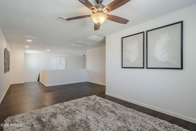 10925 E Toluca Ave, Mesa, AZ 85212 - unfurnished room with baseboards, wood finished floors, ceiling fan, and recessed lighting