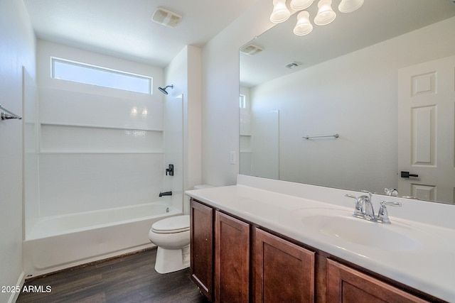 10925 E Toluca Ave, Mesa, AZ 85212 - full bathroom with wood finished floors, toilet, vanity, and shower / bath combination