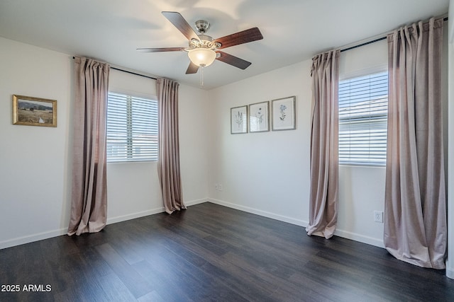 10925 E Toluca Ave, Mesa, AZ 85212 - unfurnished room with plenty of natural light, ceiling fan, dark wood-style flooring, and baseboards
