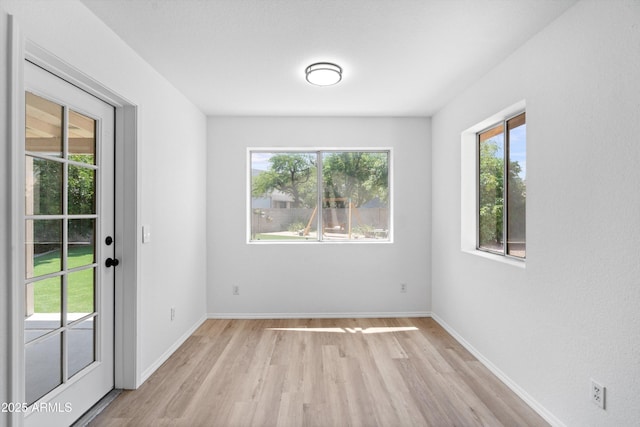 1203 W Escuda Rd, Phoenix, AZ 85027 - unfurnished room with plenty of natural light and light wood-style flooring