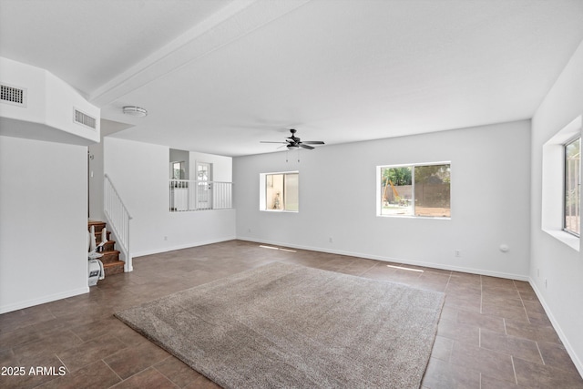 1203 W Escuda Rd, Phoenix, AZ 85027 - unfurnished living room with ceiling fan, stairs, and tile patterned floors