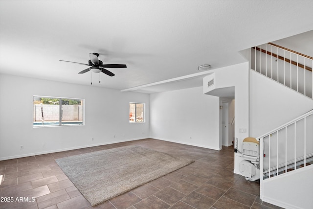 1203 W Escuda Rd, Phoenix, AZ 85027 - empty room with stairway and ceiling fan