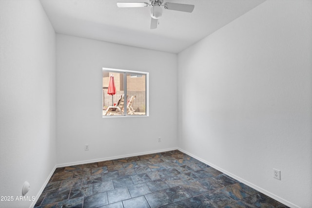 1203 W Escuda Rd, Phoenix, AZ 85027 - unfurnished room with a ceiling fan and dark stone finish flooring
