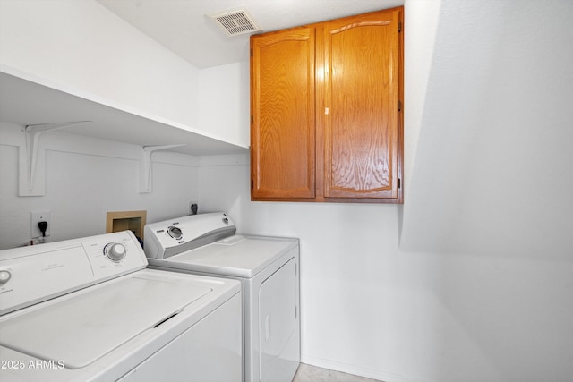 1203 W Escuda Rd, Phoenix, AZ 85027 - laundry room featuring cabinet space and washer and dryer