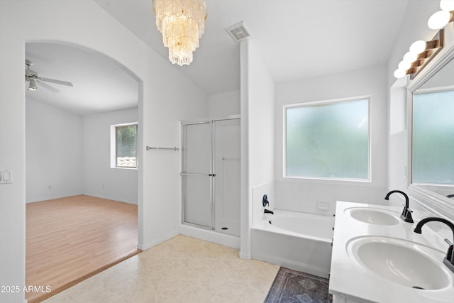 1203 W Escuda Rd, Phoenix, AZ 85027 - full bathroom with a stall shower, a chandelier, a garden tub, ceiling fan, and double vanity