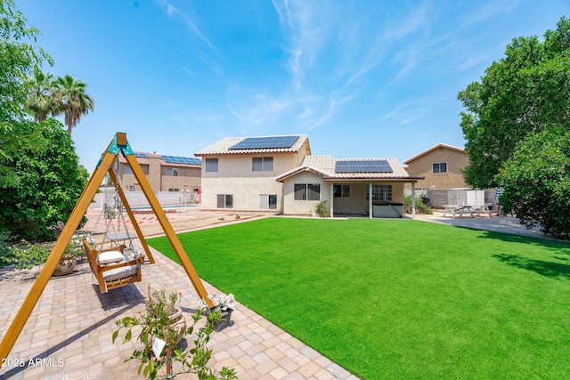 1203 W Escuda Rd, Phoenix, AZ 85027 - back of house featuring a patio area, roof mounted solar panels, a tile roof, a fenced backyard, and stucco siding
