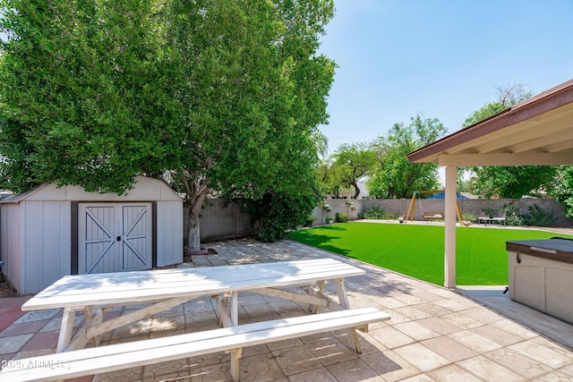 1203 W Escuda Rd, Phoenix, AZ 85027 - fenced backyard with outdoor dining space, a storage shed, and a patio area