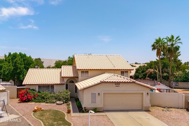 1203 W Escuda Rd, Phoenix, AZ 85027 - mediterranean / spanish-style home featuring an attached garage, a tiled roof, stucco siding, and concrete driveway