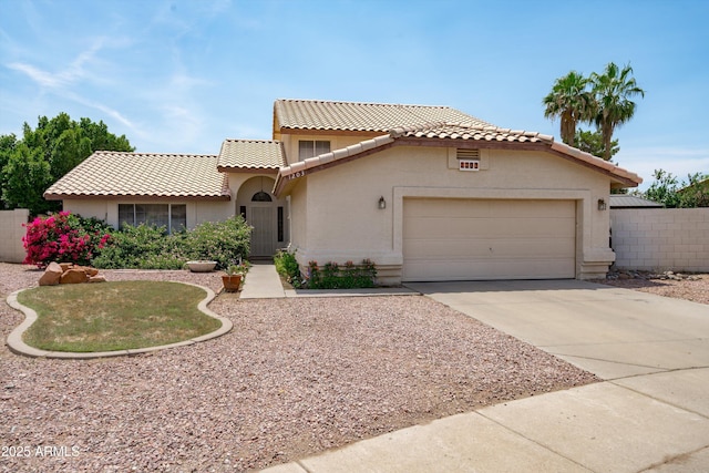 1203 W Escuda Rd, Phoenix, AZ 85027 - mediterranean / spanish-style house with a tiled roof, concrete driveway, an attached garage, and stucco siding