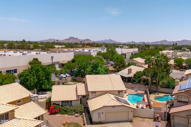 1203 W Escuda Rd, Phoenix, AZ 85027 - aerial perspective of suburban area with a mountainous background and a pool