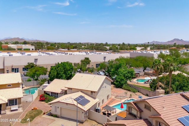 1203 W Escuda Rd, Phoenix, AZ 85027 - aerial view of residential area with a pool area and a mountainous background