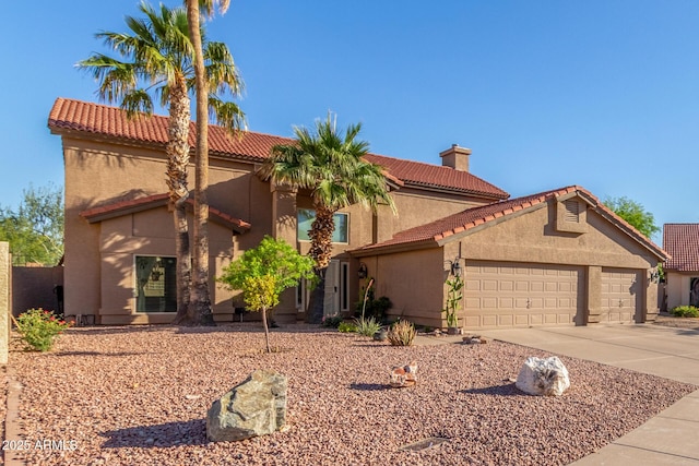 3805 E Desert Flower Ln, Phoenix, AZ 85044 - mediterranean / spanish home featuring a garage, driveway, stucco siding, a tile roof, and a chimney