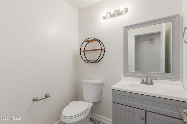 3805 E Desert Flower Ln, Phoenix, AZ 85044 - bathroom featuring toilet, vanity, and baseboards