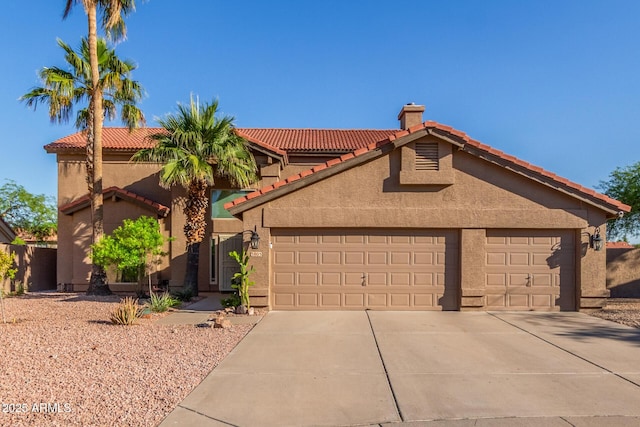 3805 E Desert Flower Ln, Phoenix, AZ 85044 - view of front of home featuring driveway, an attached garage, stucco siding, a tiled roof, and a chimney