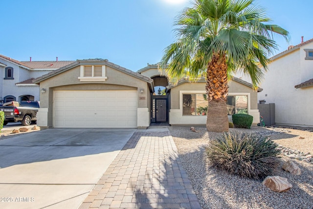 view of front of home with a garage